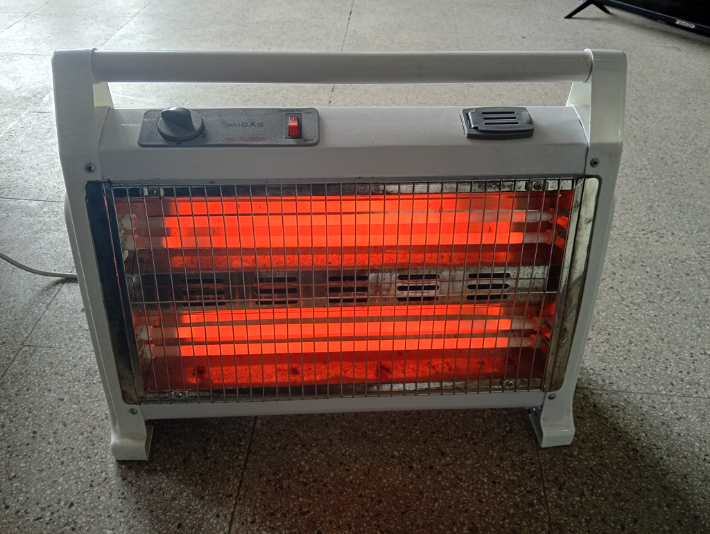 Estufa Marca Midas Modelo Md-Es1205 Usado En Buen Estado Acc No Tiene