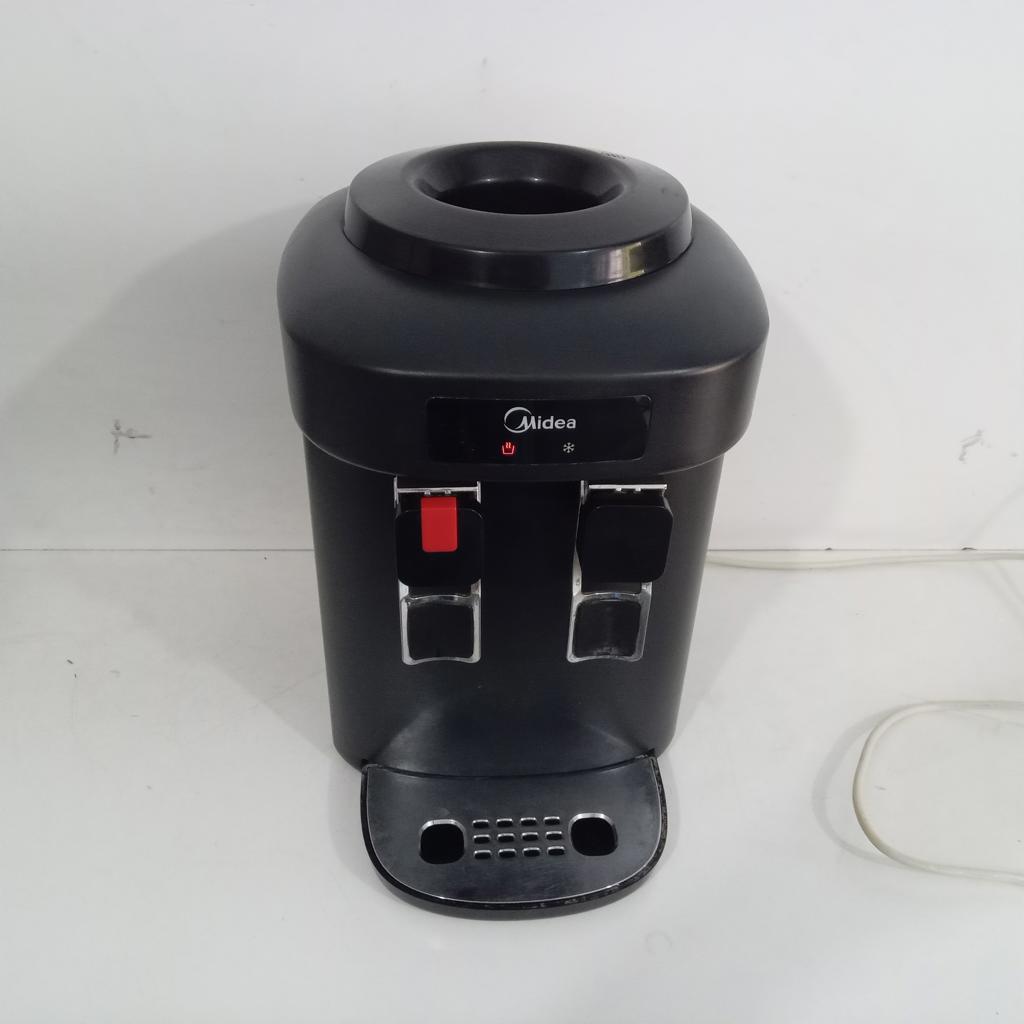 Foto 3 de Bebedero Marca Midea Modelo Usado En Buen Estado Acc No Tiene