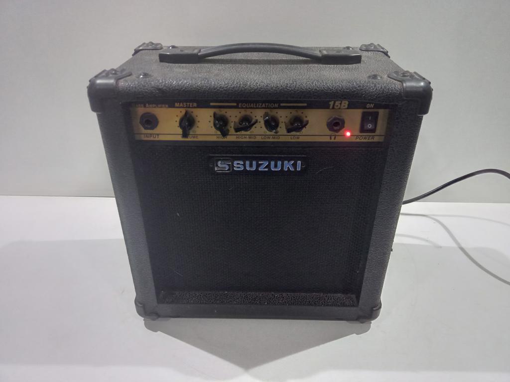 Amplificador De Sonido P/ Guitarra Marca Suzuki Modelo 15b Usado En Buen Estado Acc Manija