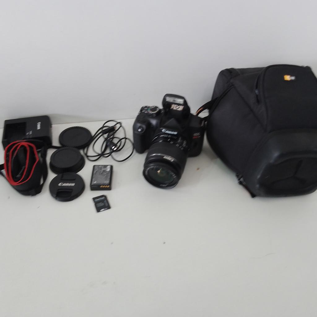 Camara Fotografica Profesional Marca Canon Rebel T6 Wifi Modelo Ds126621 Usado En Buen Estado Con Correa 3 Tapas Acc Cargador Lc-E10 1 Bateria 22276 Lente 18-55mm (6050146) Estuche De Tela Caslogic Tarjeta 32gbCable Usb