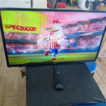 Televisor Led Convencional De 32 '' Marca Enxuta Modelo Ledenx1232sdf2ka Usado En Buen Estado Con Control Sin Caja Acc No Tiene