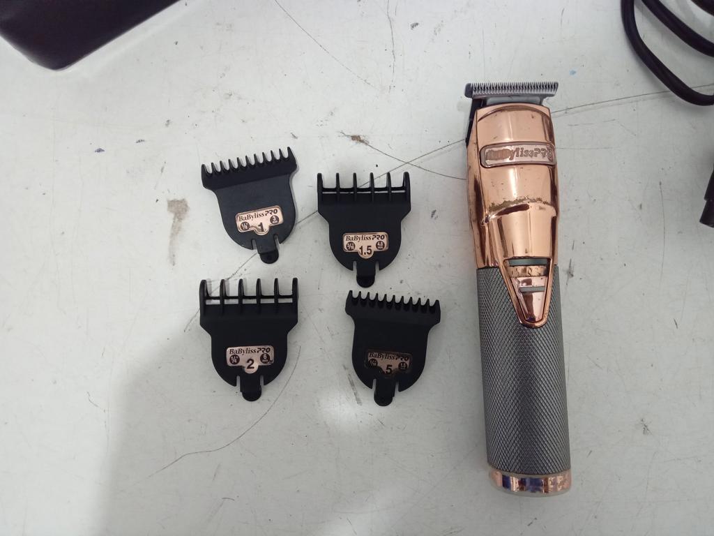 Maquina De Cortar Cabello Marca Babyliss Modelo B788rguz Acc CargadorCuatro Niveles De Cortes