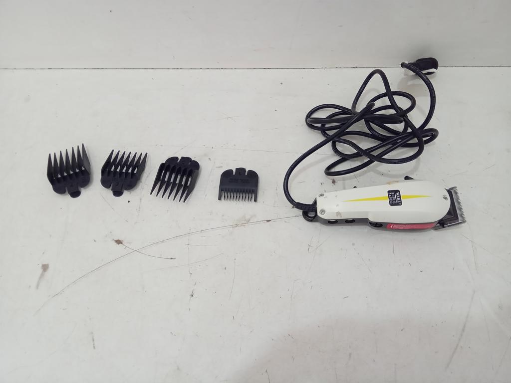 Maquina De Cortar Cabello Marca Walh Modelo Walh Clipper Corp Usado En Buen Estado Acc Con 4 Medidas De Corte