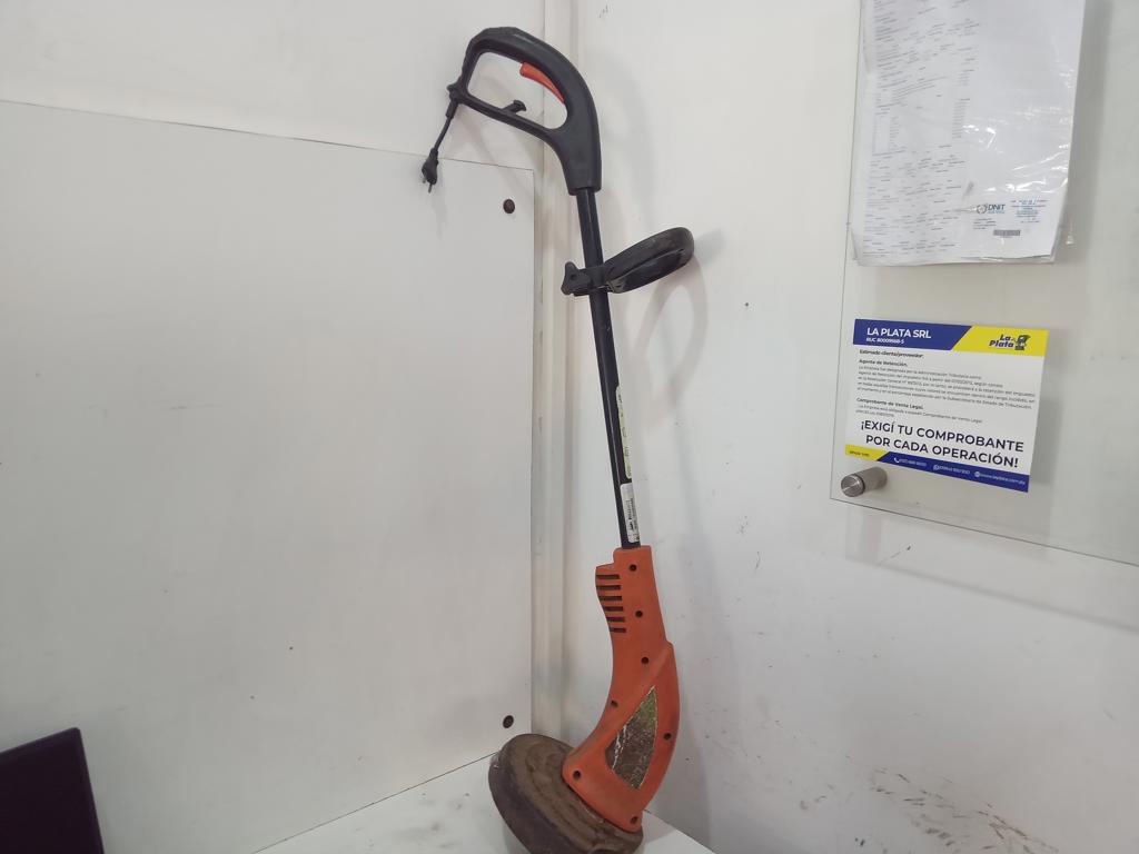 Bordeadora De Cesped Marca Tramontina Modelo At700 Usado En Buen Estado Acc Con Protector