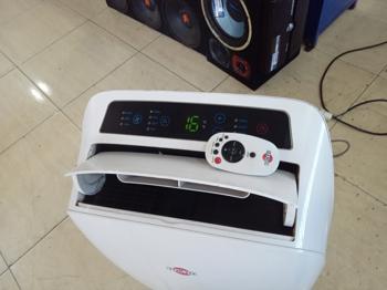 Aire Acondicionado Tipo Portatil Marca Tokyo Modelo Aatokport21.12chr1 Potencia Btu 12.000 Con Control Usado En Buen Estado Acc Control Caño Corrugado