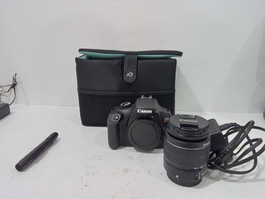 Camara Fotografica Marca Canon Modelo Rebel T100 Acc CargadorLenteLapiz