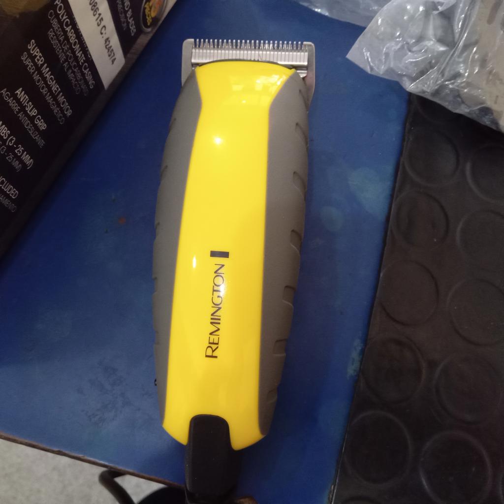 Maquina De Cortar Cabello Marca Remington Modelo Hc-5850 Usado En Buen Estado Acc 8 Nivel De CorteTijeraPeine Aceite