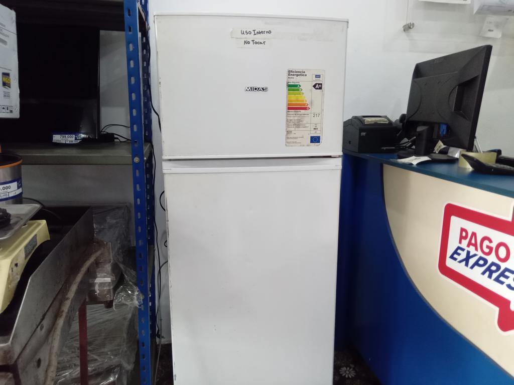 Foto 2 de Heladera Marca Midas Modelo Md-Hd300 Usado En Buen Estado Litros 300 Acc Parrilla1 Bandeja1 VerduleraPorta Huevo