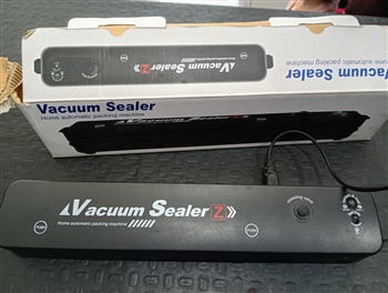 Sellador De Bolsa Marca Vacuum Sealer Modelo Tk-001 Usado En Buen Estado Con No Tiene Acc En Caja