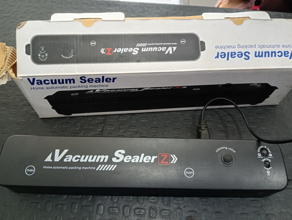 Sellador De Bolsa Marca Vacuum Sealer Modelo Tk-001 Usado En Buen Estado Con No Tiene Acc En Caja