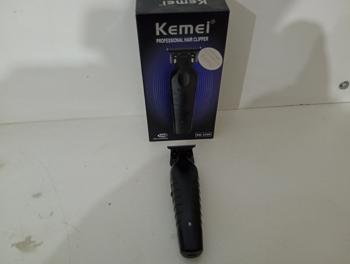Maquina De Cortar Cabello Marca Kemei. Modelo Km-2299 Usado En Buen Estado Acc Tres PeinetasCable Usb