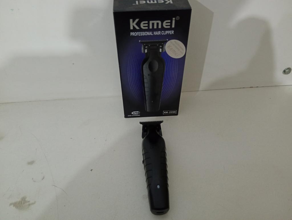 Maquina De Cortar Cabello Marca Kemei. Modelo Km-2299 Usado En Buen Estado Acc Tres PeinetasCable Usb